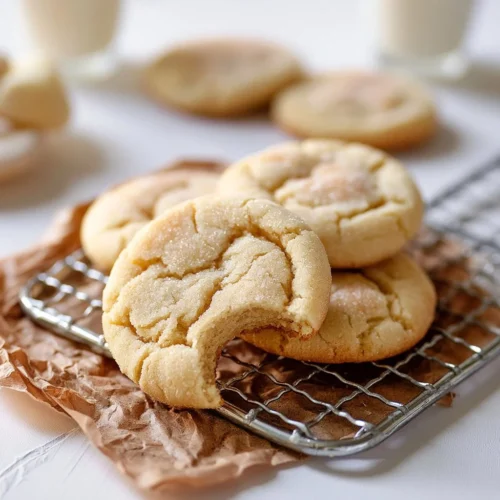 Delicious homemade easy sugar cookies on a baking tray.