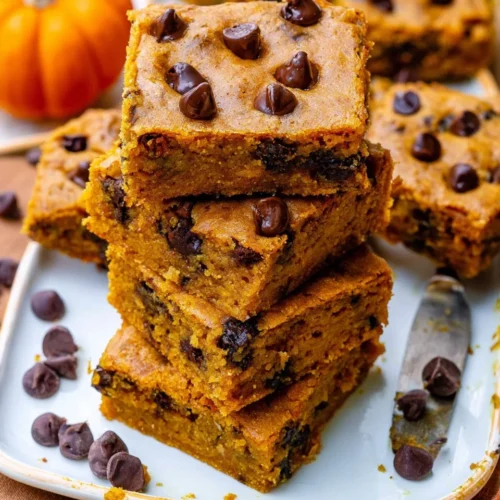 Delicious easy pumpkin chocolate chip blondies served on a plate
